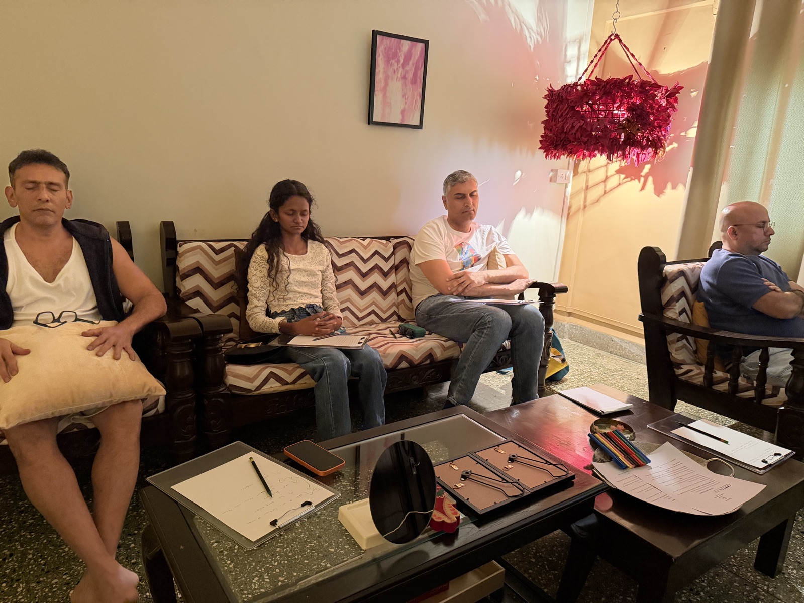 Participants seated in a circle during a quiet workshop practice